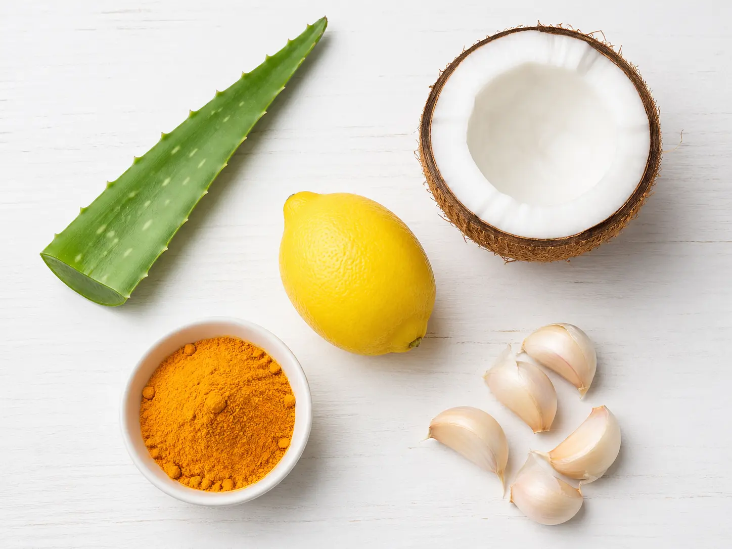 Natural home remedies for shoulder acne - aloe vera, coconut oil, lemon, turmeric, garlic